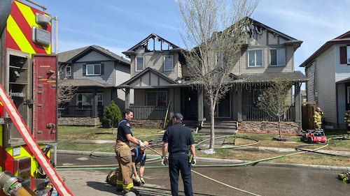 A duplex at 29 Avenue and 15 Street was damaged by fire on May 12, 2026. (Dave Mitchell/CTV News Edmonton)