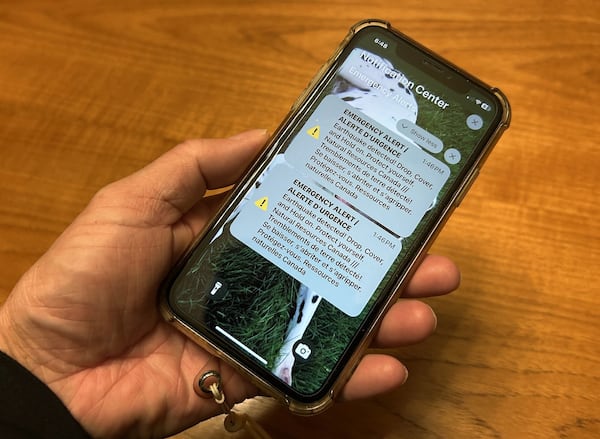Why does B.C. keep hesitating to use emergency text alerts during disasters?