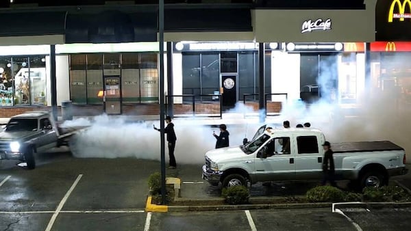 Video shows teens scrambling to take video of pickup doing doughnuts in McDonald’s parking lot