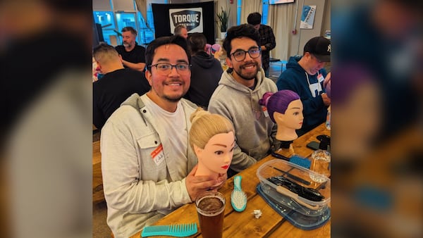 The hair classes teaching Winnipeg dads to brush and braid between sips of beer