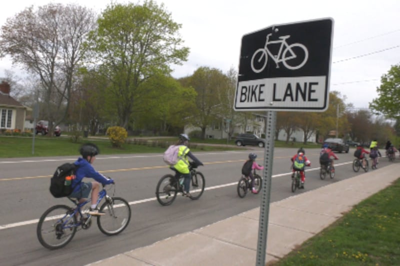 ‘It’s good exercise’: Students take the Bike Bus to school