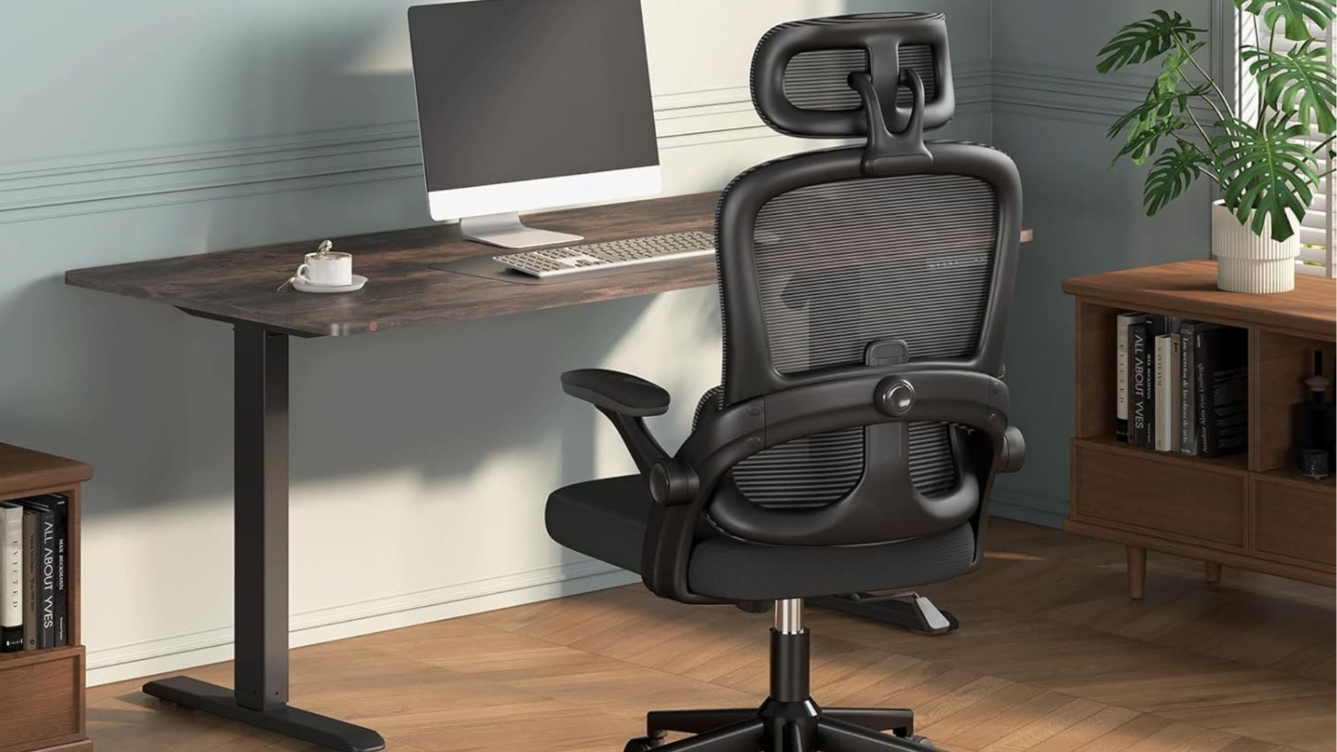 An ergonomic office chair at a desk.