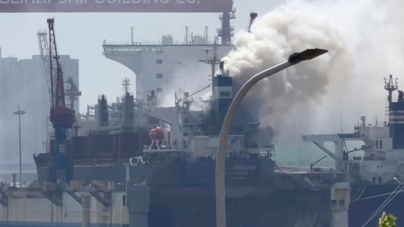 At least 20 dead and 5 missing after cargo ship catches fire in China's port, state media says