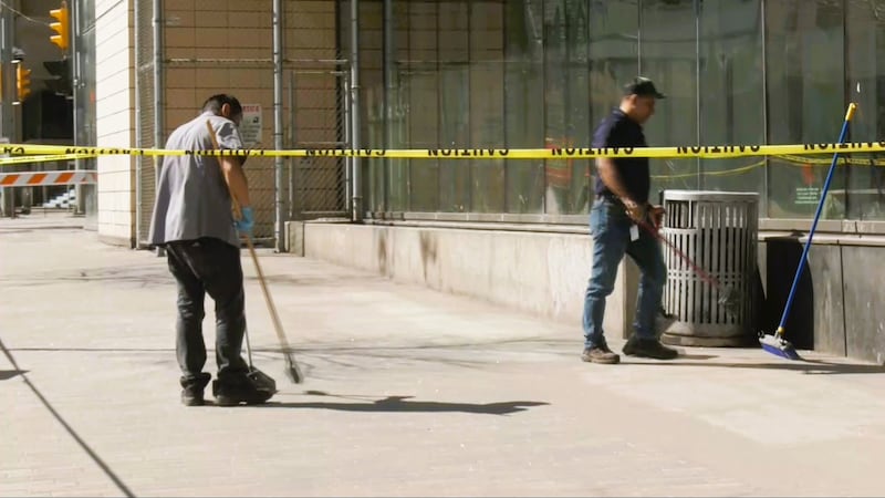 Broken glass falls from 6th floor window in downtown Calgary