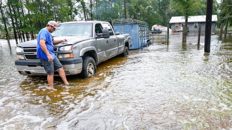 Former Tropical Storm Edouard lingers over Texas, flooding homes and roadways