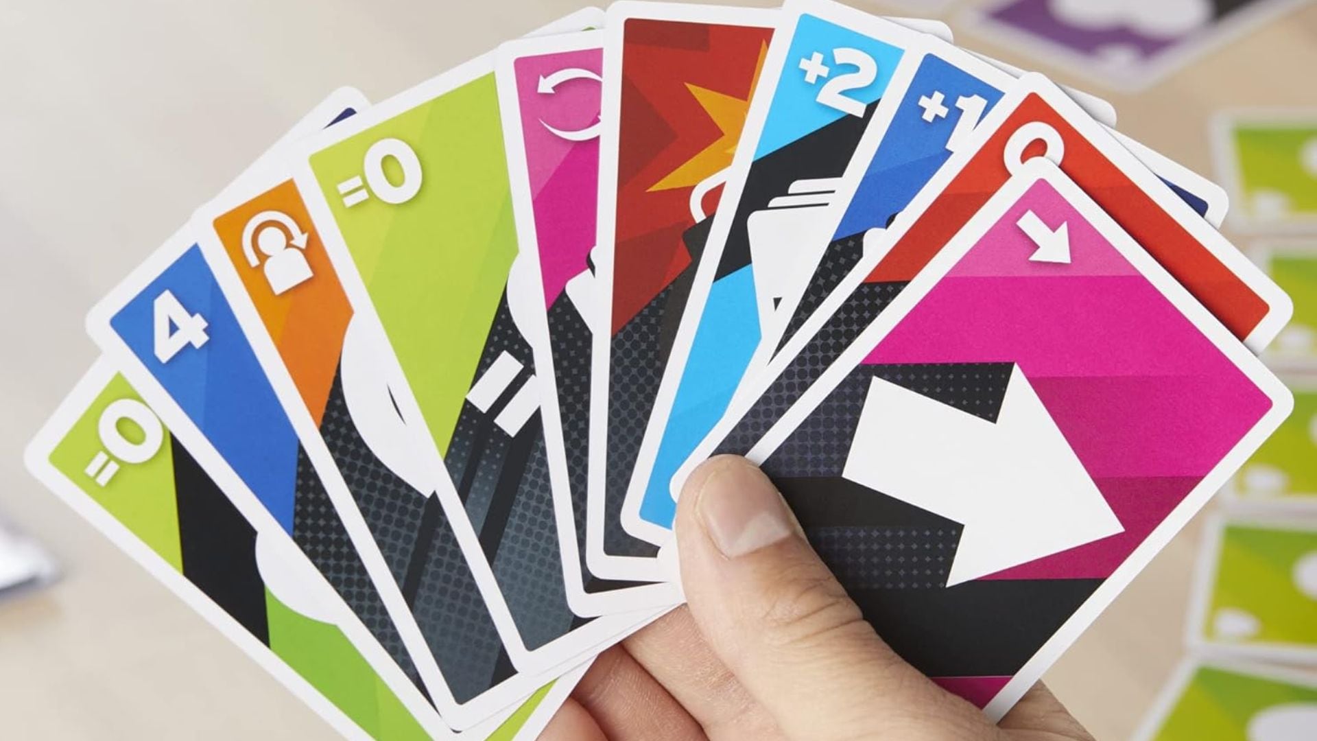 A person holding 5 Alive cards.