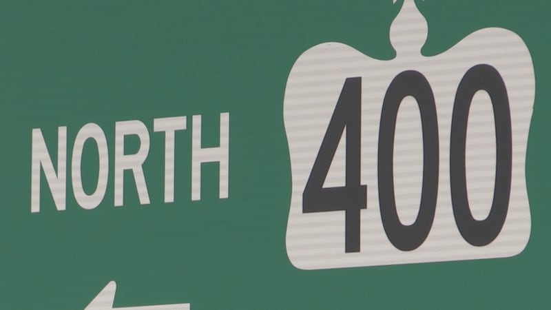 No injuries in tractor-trailer rollover on Highway 400: Police