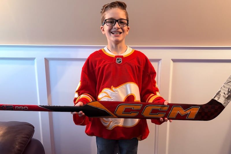 ‘Wolf, you are my idol’: Flames netminder gifts stick to 10-year-old fan in the stands