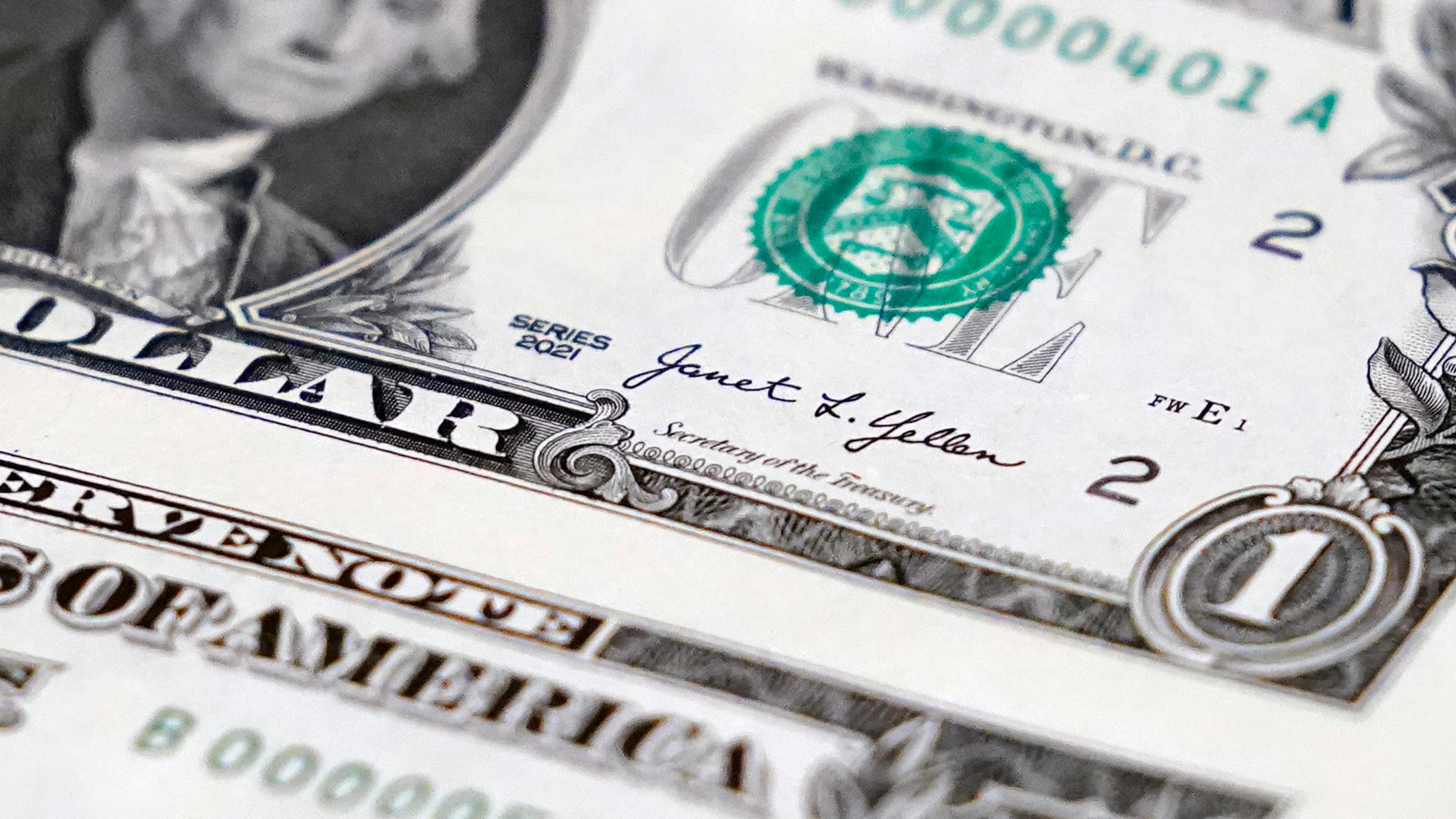 A newly printed U.S. dollar bill is shown at the Bureau of Engraving and Printing's Western Currency Facility in Fort Worth, Texas, on Dec. 8, 2022. (AP Photo/LM Otero, File)