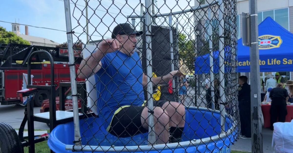 Dunking Raffle Local leaders take part in annual dunk tank fundraiser