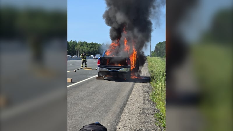 Truck goes up in flames along Hwy. 400, stranger steps in to help