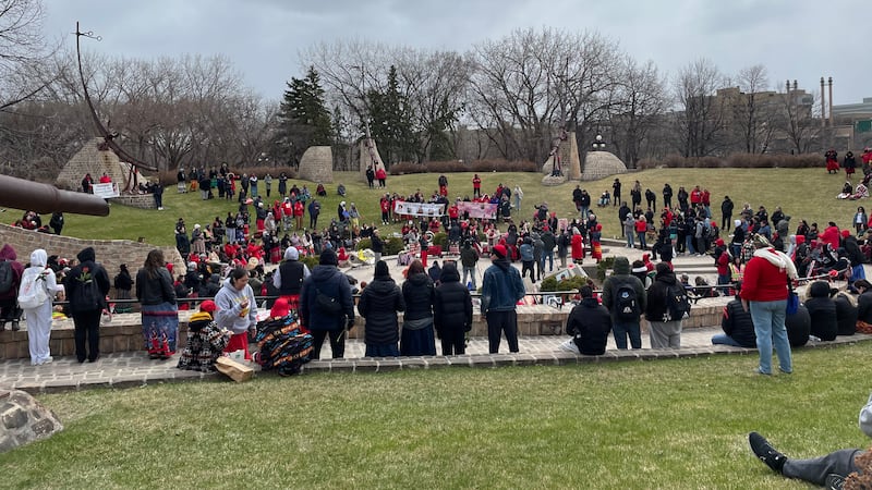 Dozens of Manitobans march for change on Red Dress Day