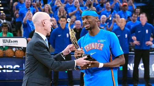 Canada’s Shai Gilgeous-Alexander gets the MVP trophy from NBA Commissioner Adam Silver