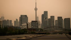 ‘Brutal’: Ontario outdoor workers stay home, others mask up amid wildfire smoke