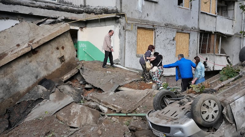 Russia’s missile and drone attacks on Ukraine kill at least 22