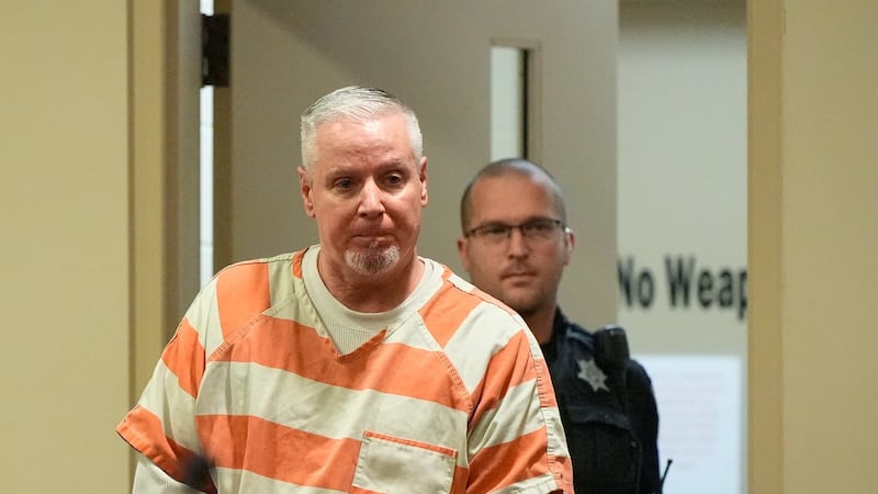 Father who gave his son the gun used in a Georgia high school shooting faces sentencing