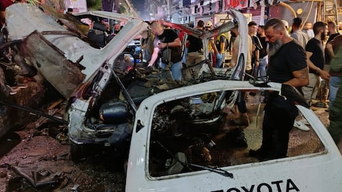Explosion kills 2 people and wounds others in a suburb of the Syrian capital