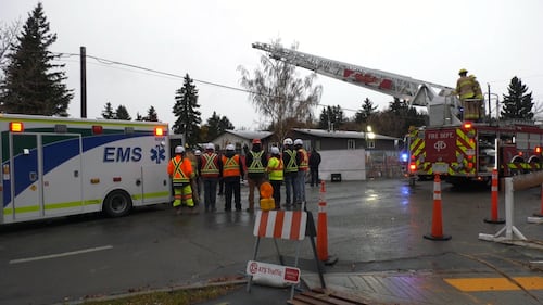 1 person hospitalized in stable condition after falling into manhole on construction site