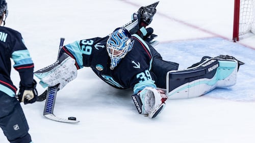 Kokko attempts goalie goal in 1st NHL start, stops 26 shots as Kraken beat Flames 4-1