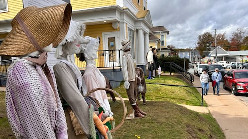 Scarecrows are pictured.
