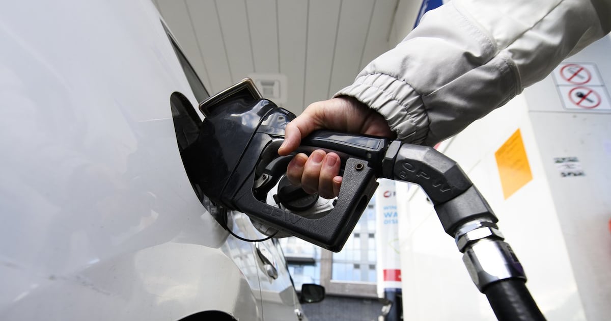 A woman gasses up at a gas station in Mississauga, Ont., Tuesday, February 13, 2024. THE CANADIAN PRESS/Christopher Katsarov