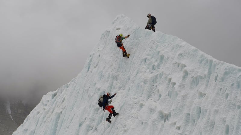 A record 274 climbers scale Mount Everest in a single day