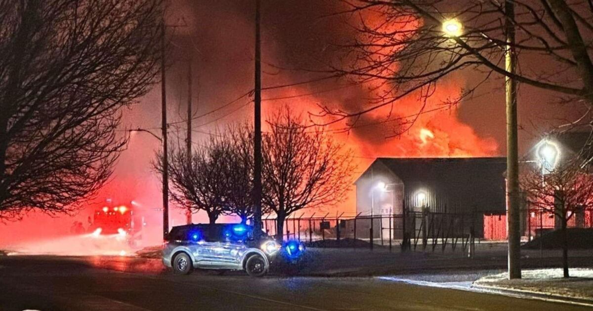 Stfd Fire Crews use excavator to get at hot spots after destructive Stratford fire