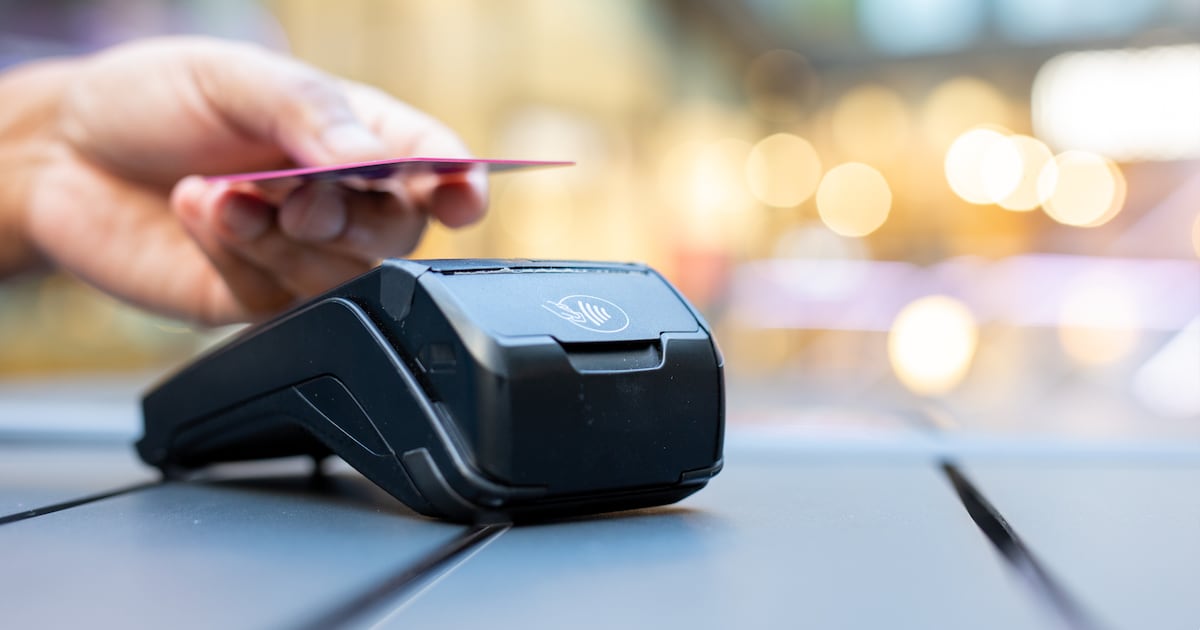 Photo: ctvnews.ca A stock photo of a person using a credit card at a retail checkout. (File photo/jorge Mata/Getty Images)