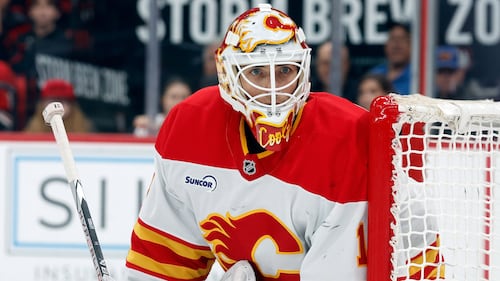 Flames goalie Devin Cooley tries his hand at juggling to help prepare for the new season