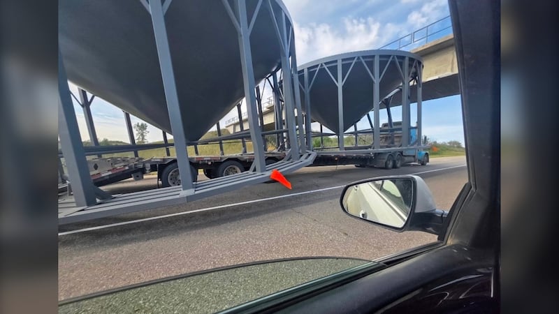 Semi-truck driver charged after hitting train bridge near Borden, Saskatchewan