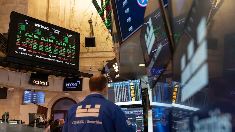 Wall Street slips from its record following the latest weak update on the U.S. economy