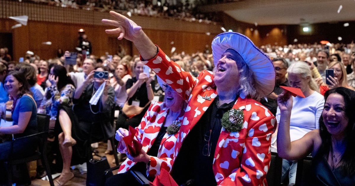 Spectators throw paper planes during the Ig Nobel Prize ceremony held in the Zurich Convention Center in Zurich, Switzerland, on Thursday, Sept. 3, 2026. (Claudio Thoma/Keystone via AP)