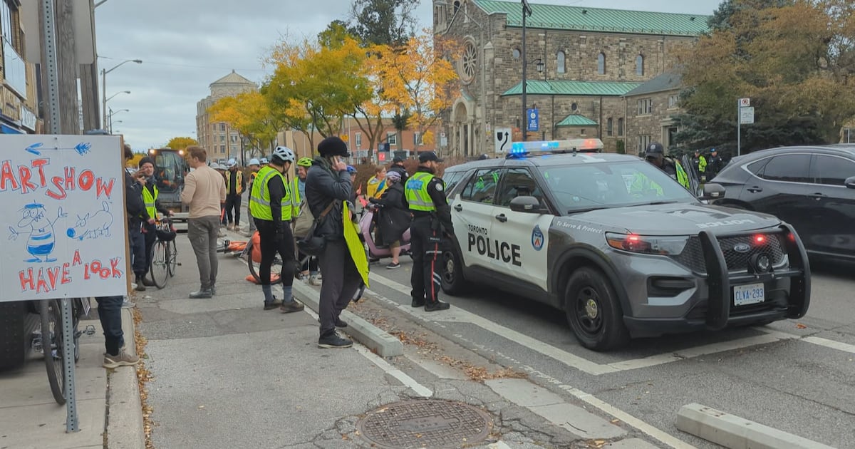 Photo: ctvnews.ca Protestors and police continue to show their presence along Bloor Street West as construction to remove bike lanes continue