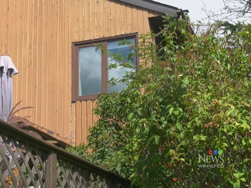 Nude photo of woman taken through bedroom window, shared with condo board