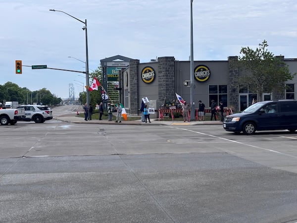 Traffic delays reported due to convoy of vehicles near Windsor-Detroit border
