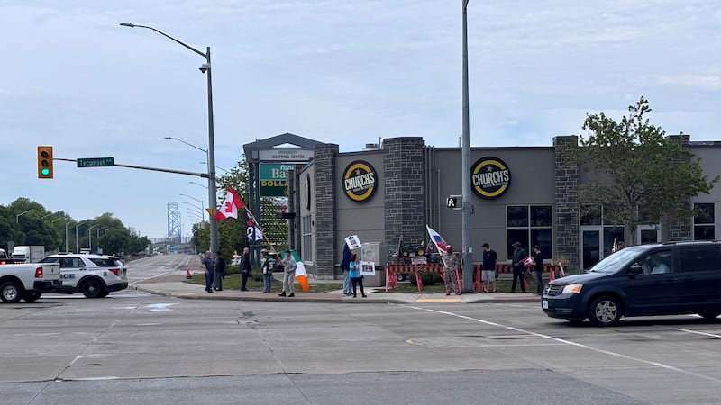 Traffic delays reported due to convoy of vehicles near Windsor-Detroit border