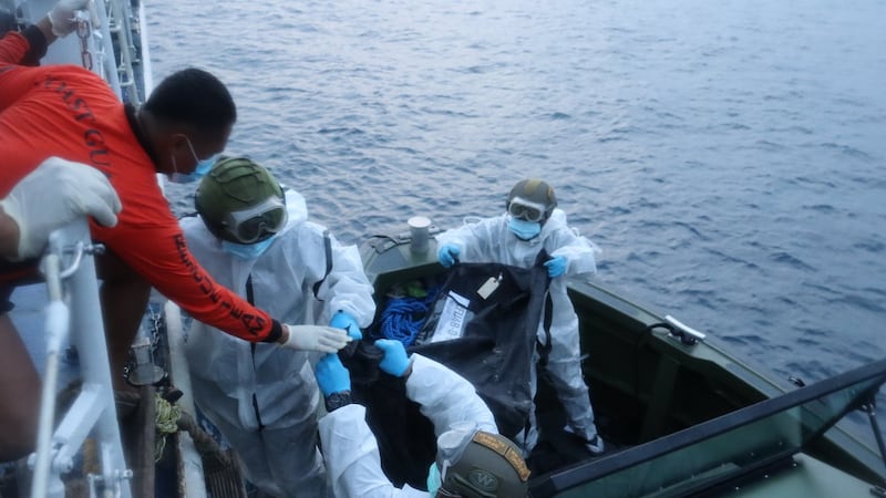 Rescuers pull more bodies from burned Philippine ferry as death toll hits 76