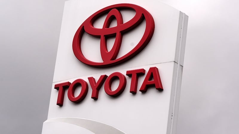 Japan's Toyota reports hefty profit on cheap yen and solid car sales