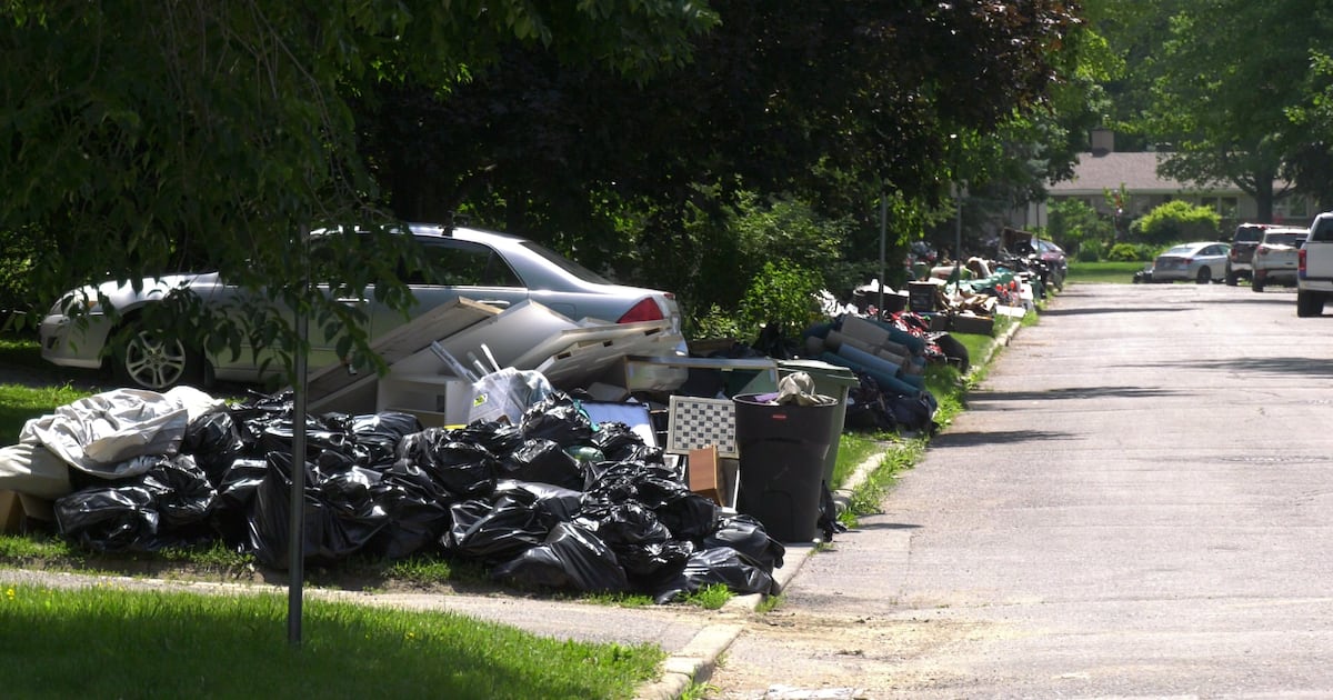 Crystal Beach residents frustrated as rotting food and debris sits at curb one week after storm