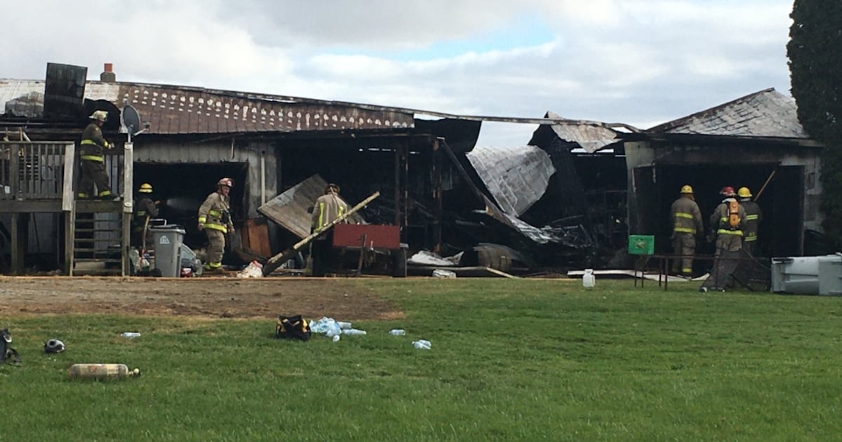 Firefield Strathroy Garage fire spreads to vacant home south of Strathroy