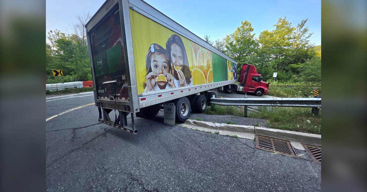Driver charged after vehicle gets stuck