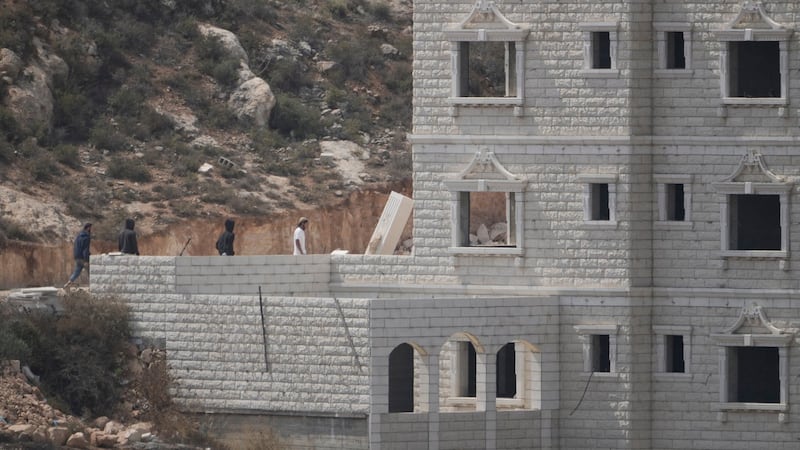 Iran's leader calls for Muslim unity, NBC crew attacked in West Bank and other Mideast news