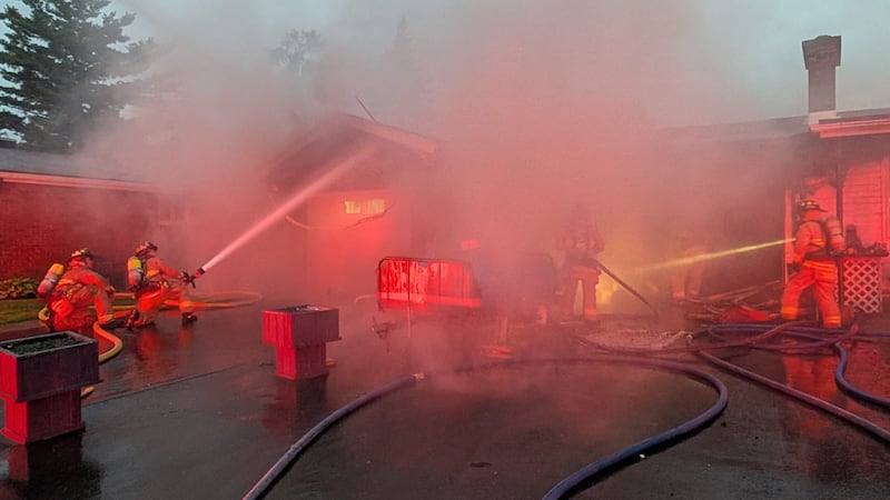 Firefighters extinguish two-home blaze in Parkwood Hills