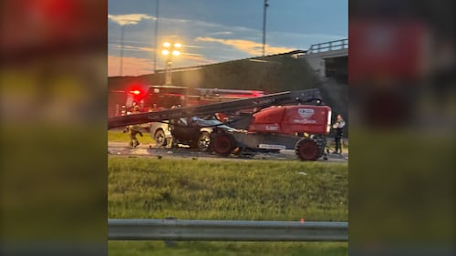 Emergency responders work at a crash scene involving an SUV and scissor lift work platform at the intersection of Highways 16 and 60 the morning of May 28, 2026. (Source: Provided)