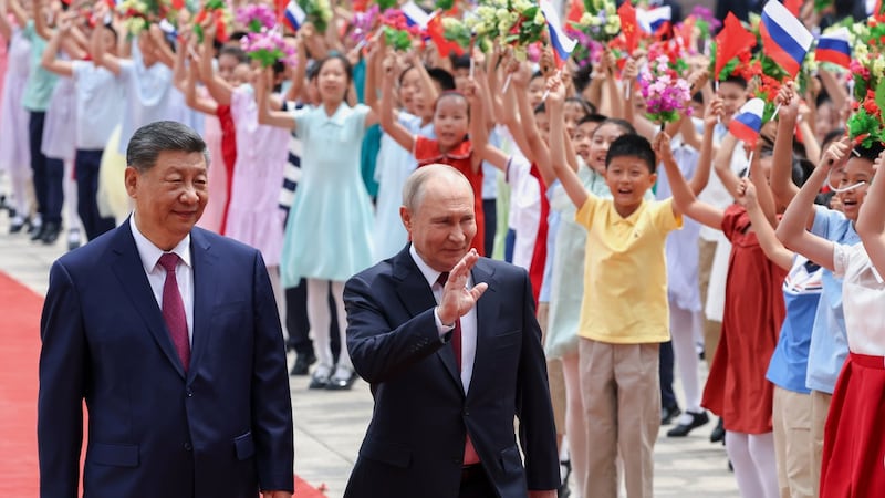 Xi and Putin highlight their friendship and cooperation on energy and other issues in Beijing visit
