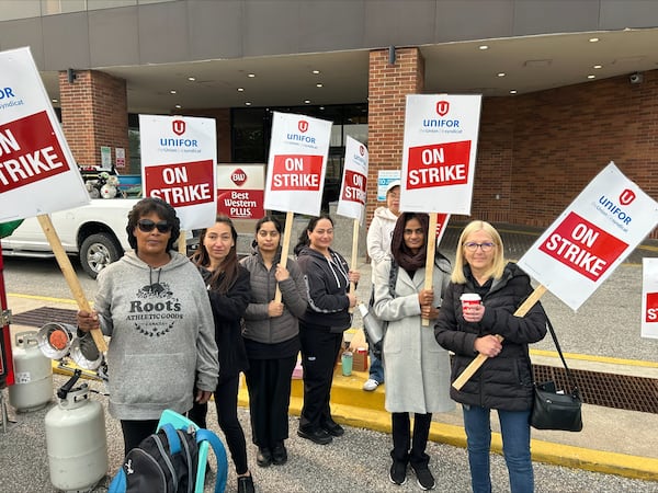 Unifor members on the picket line at Best Western Plus in Windsor on Sunday