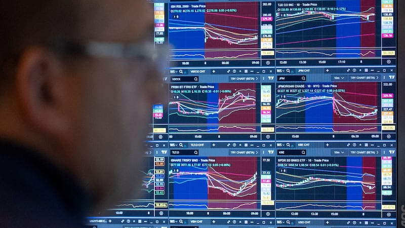 Wall Street finishes its record-setting week with gains