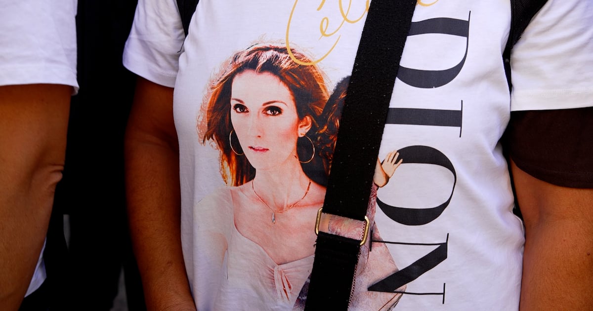 Photo: ctvnews.ca A fan wears a Celine Dion t-shirt while standing outside the singer