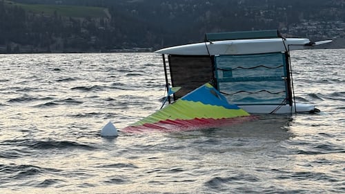 Boater rescued after catamaran capsizes on Okanagan Lake