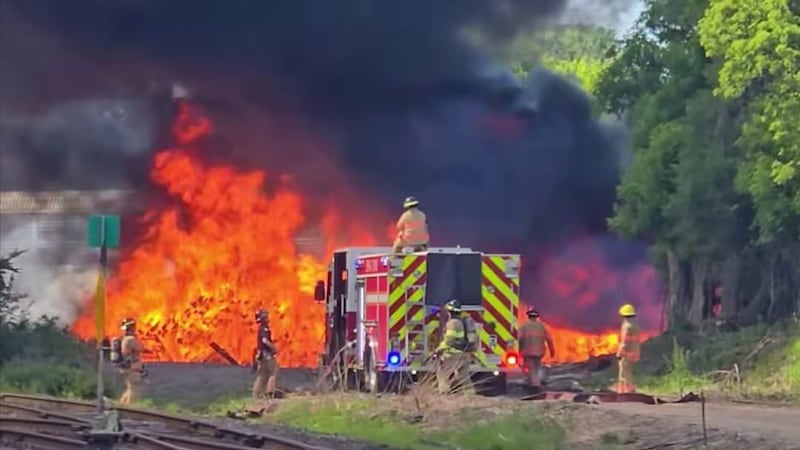 Black smoke billows from London, Ont. rail tie fire